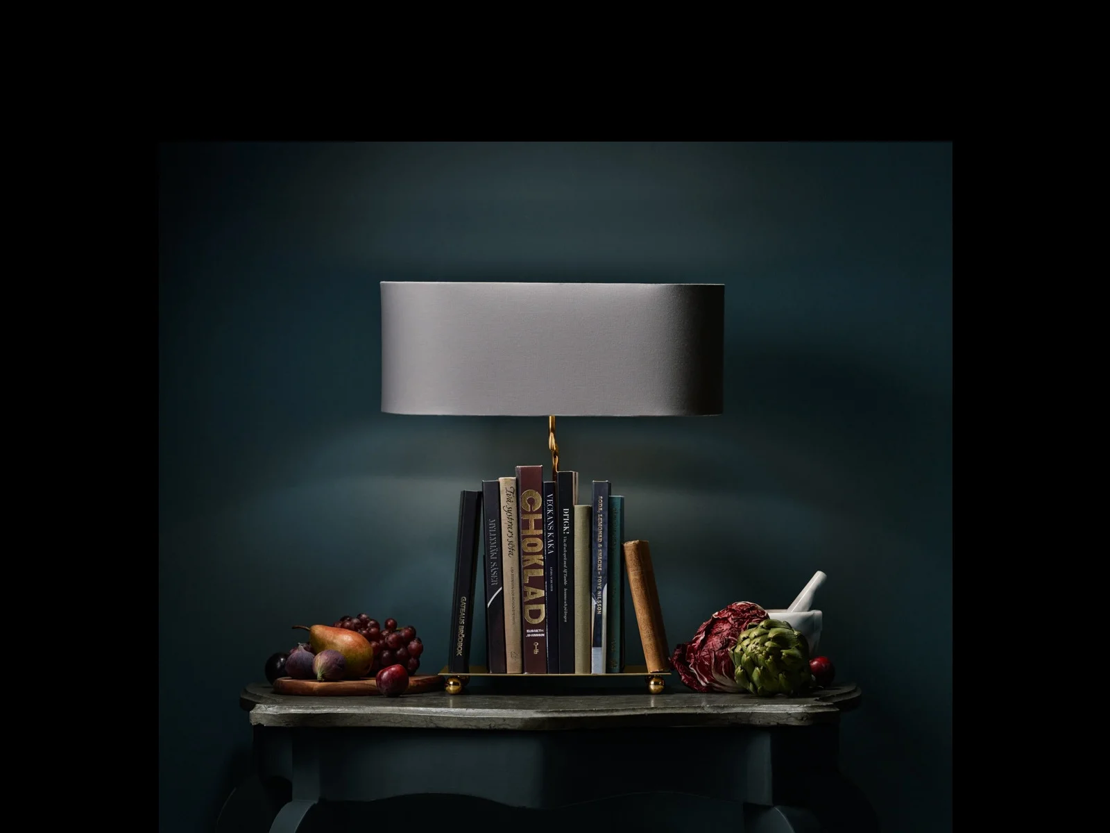 The BookLovers' Light med stilleben och böcker