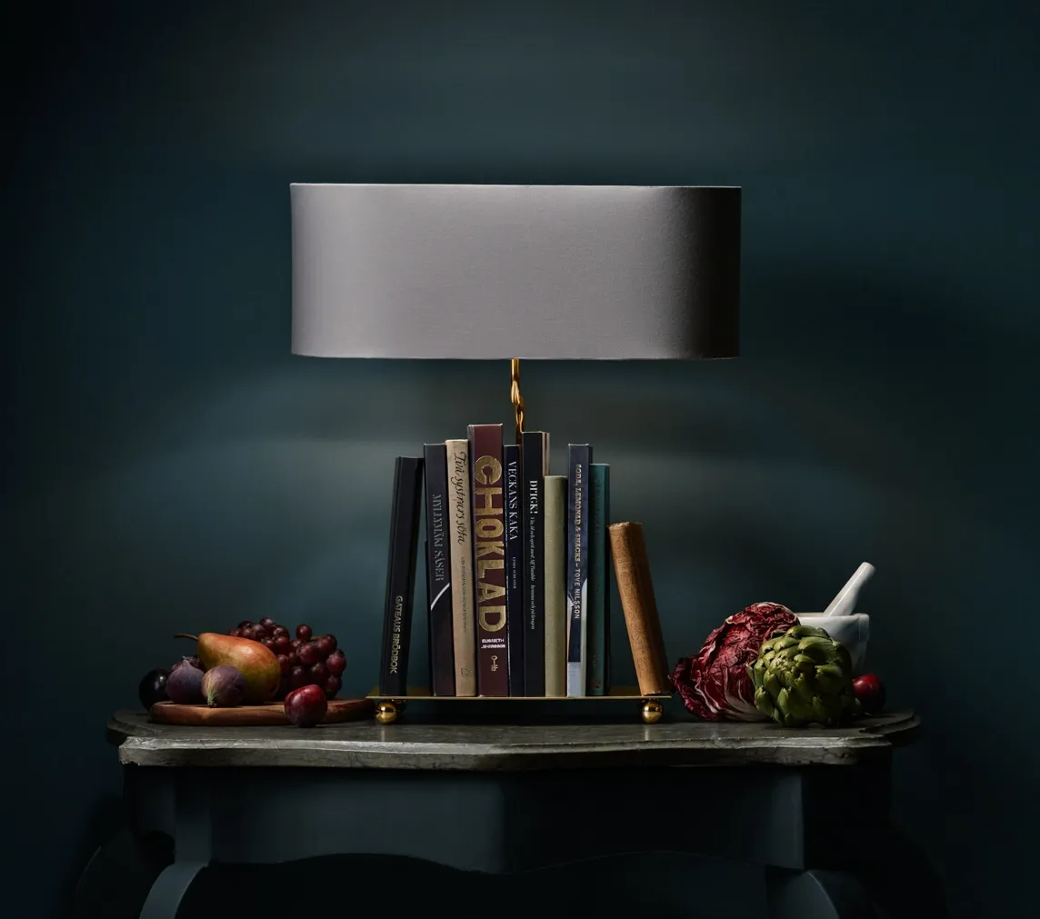 The book lover's light with books and still life styling